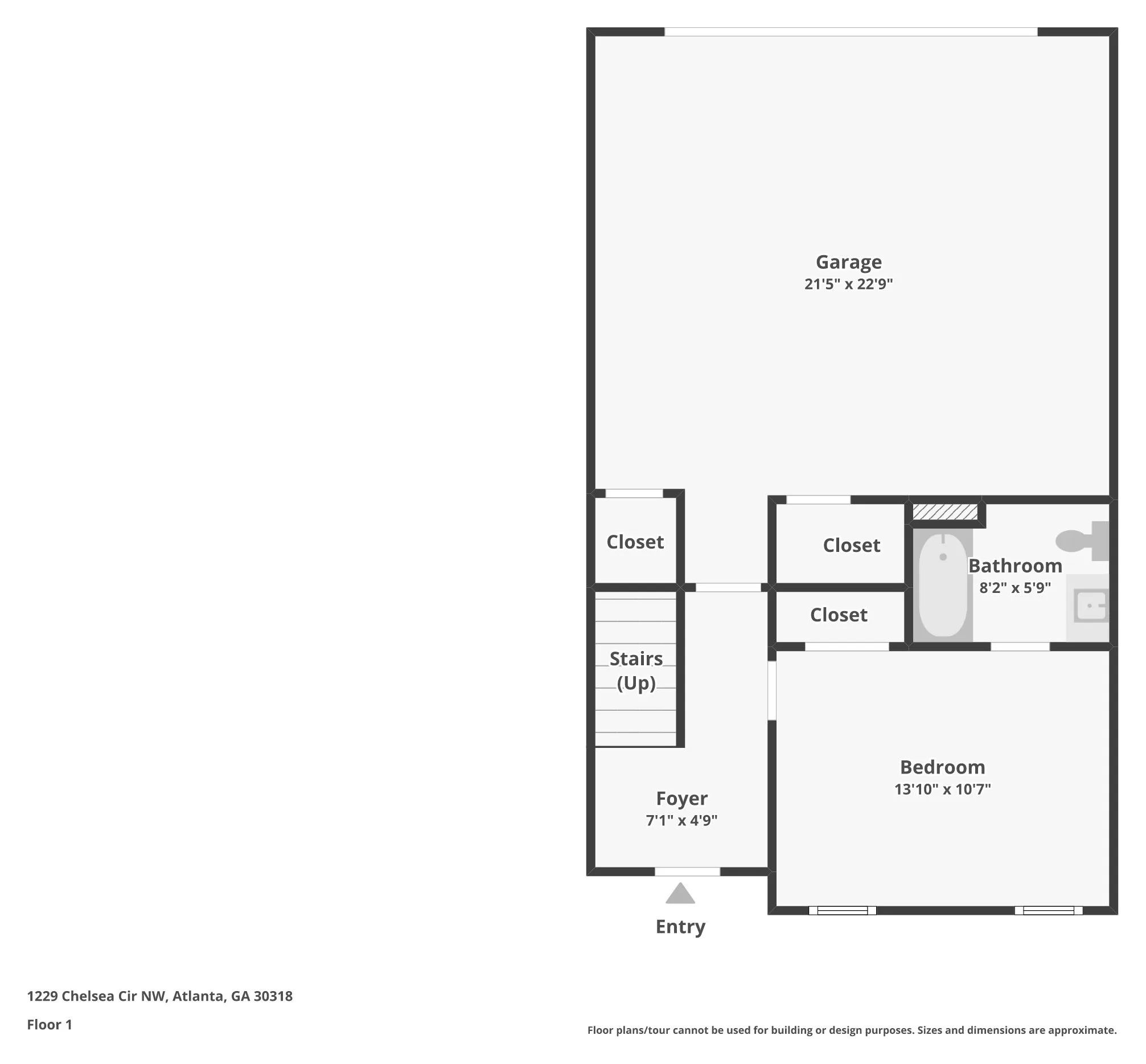 Floor 1 plan of 1229 Chelsea Cir NW: two-car garage, bedroom, full bathroom, foyer and stairs up.